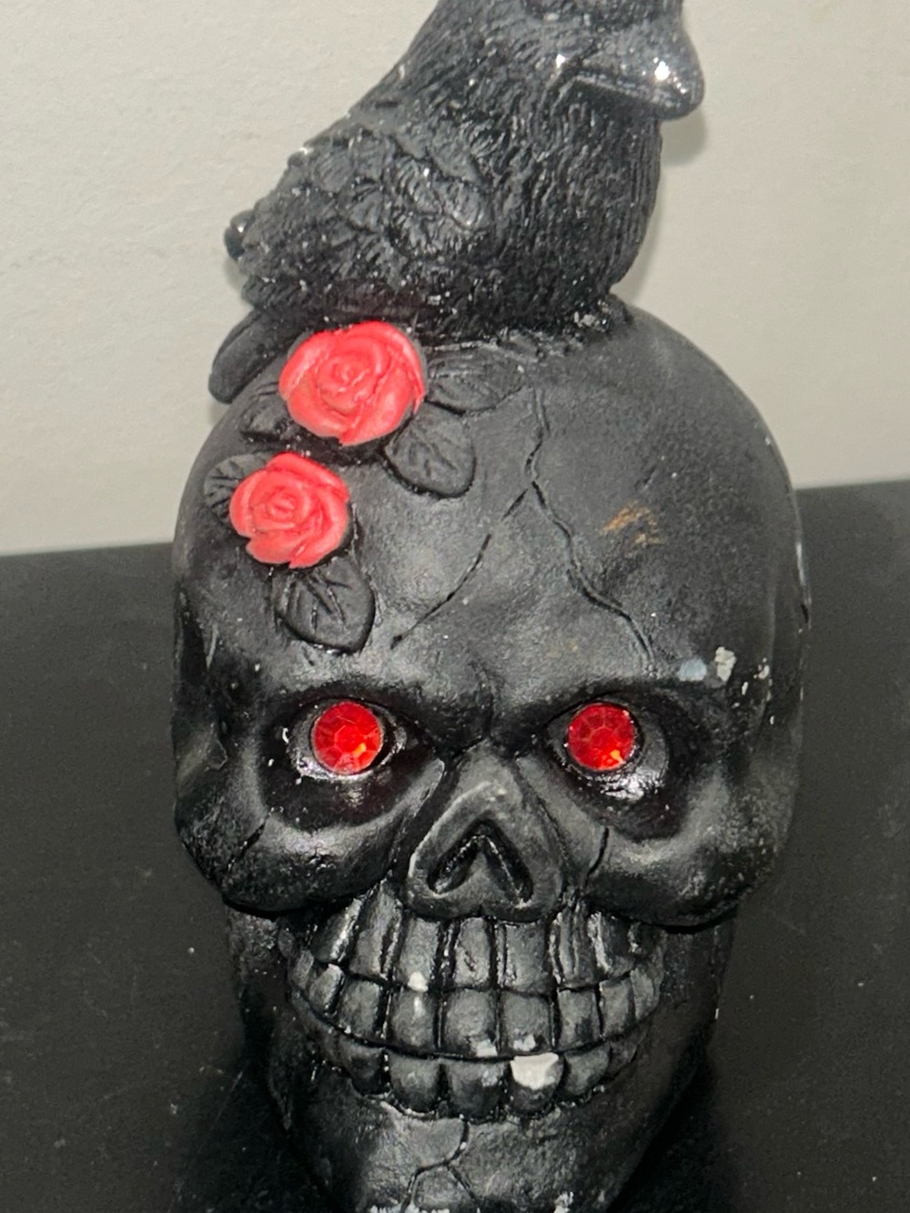 Black Skull Accent Figurine with Red Rose Details